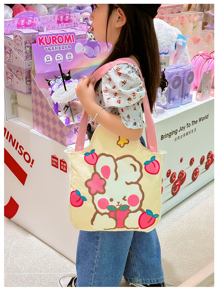 Wholesale cartoon canvas bags, female student tutorial bags, Japanese-style illustration large-capacity single-shoulder bags, cute hand-carry bags undefined