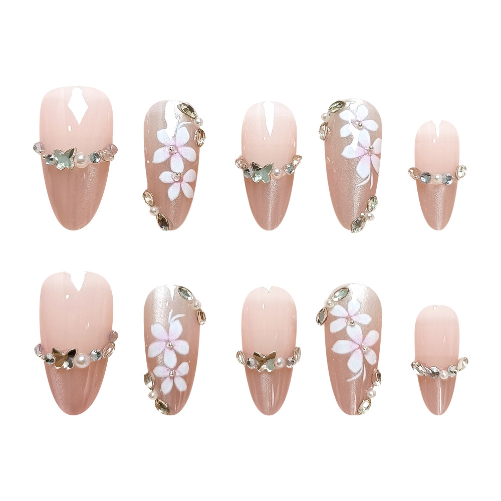 Juego de 10 pegatinas para uñas cortas en forma de almendra, puntas de uñas cortas con diseño floral blanco, uñas postizas con efecto ojo de gato y diamantes de imitación hechas a mano.