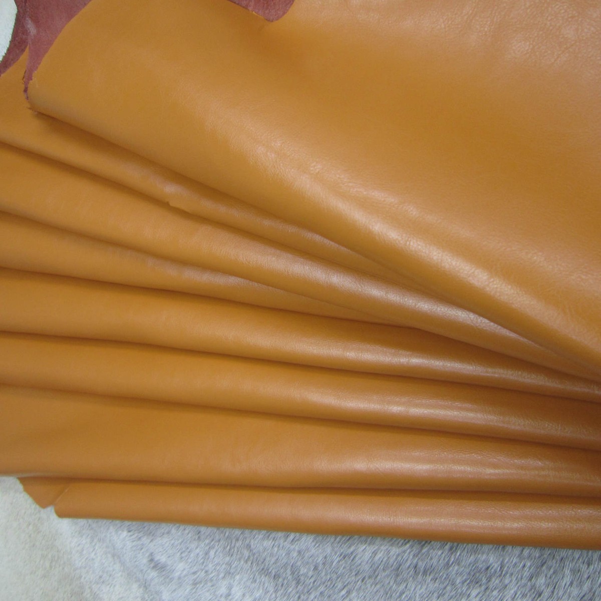 土黄色二层牛皮251纹真皮皮料