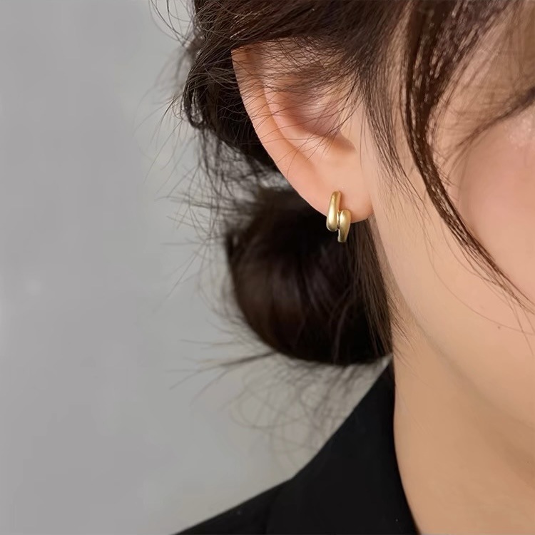 Small design golden universal earrings