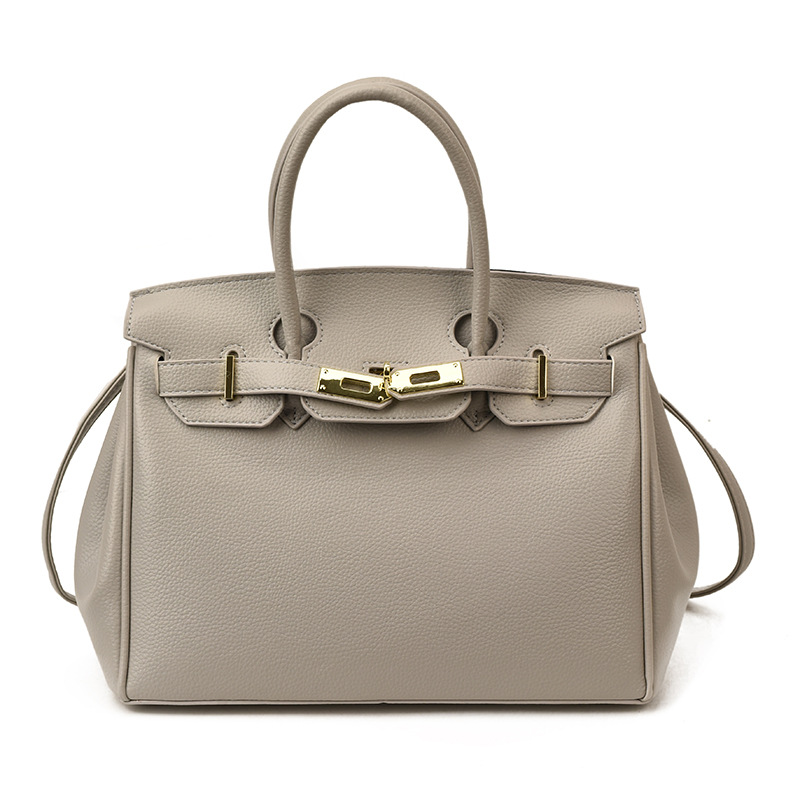Bolsos de platino retro retro de alta calidad para mujeres 2026 comercio exterior nueva moda litchi pattern commuter mochila versátil
