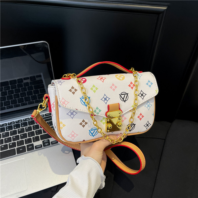 Bolso de textura transfronteriza 2025 verano nuevo bolso femenino retro color contraste bolso de hombro cadena de moda bolso de mensajero marea