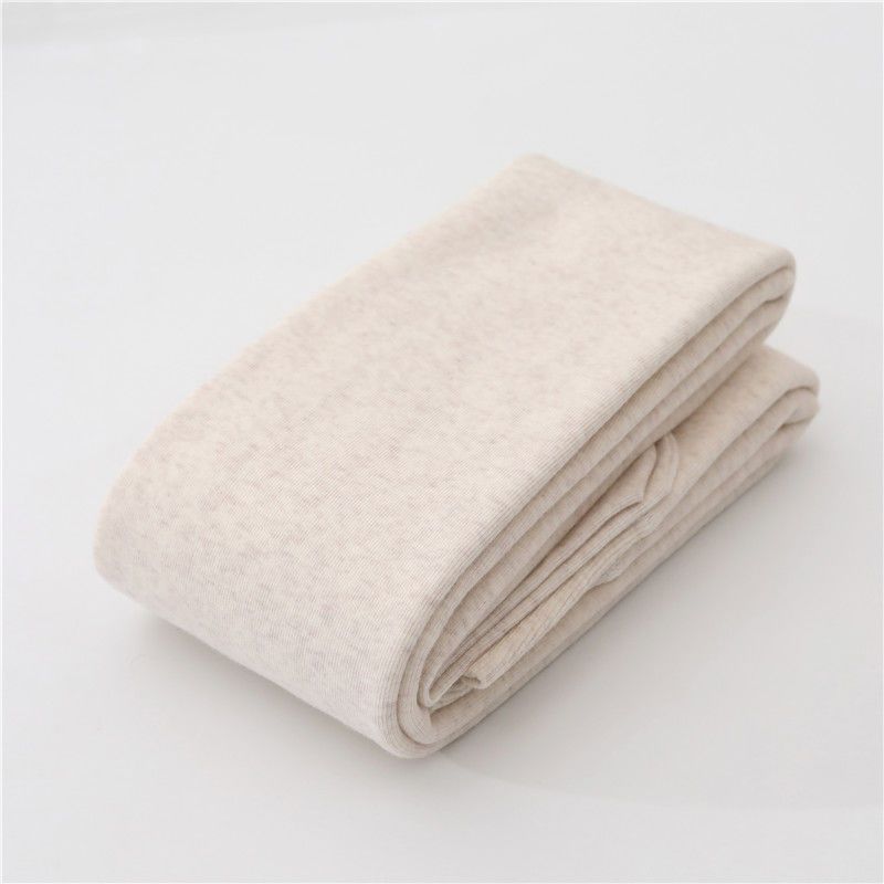 カシミヤの底のズボンの女性のベルベットの厚いズボンの靴下の春秋冬の系のオート麦の白い薄い色の縦の紋様の保温のズボンはやせています。