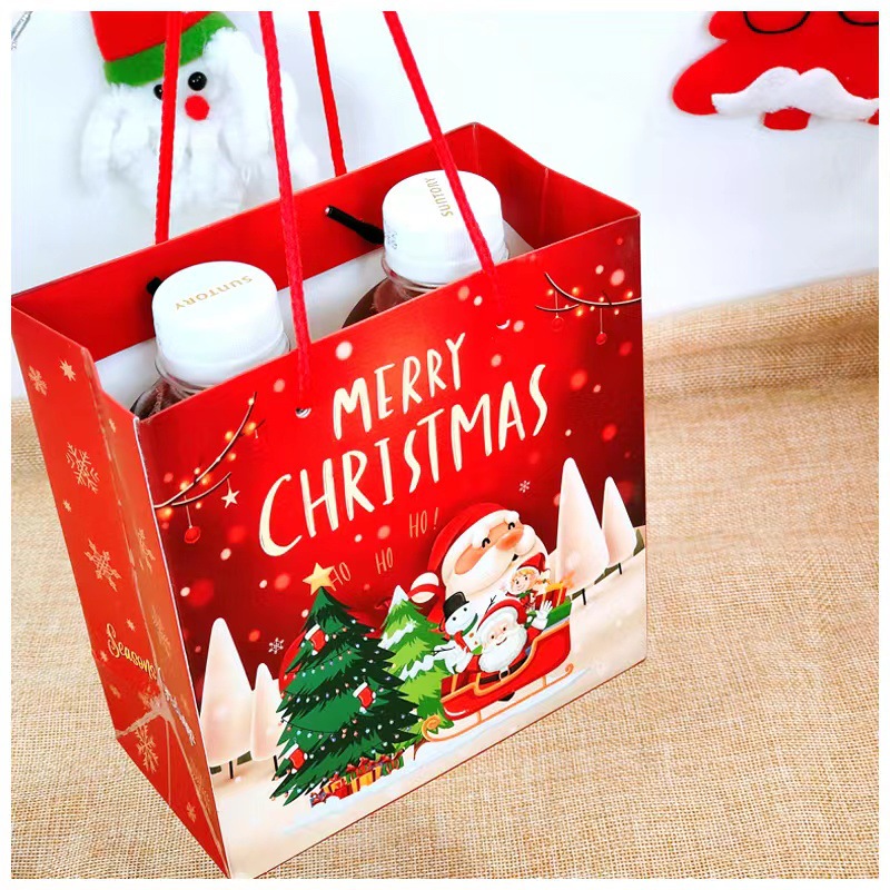 Nueva bolsa de regalo de Navidad bolsa de embalaje de regalo bolsa de papel Lindo bolso rojo de dibujos animados