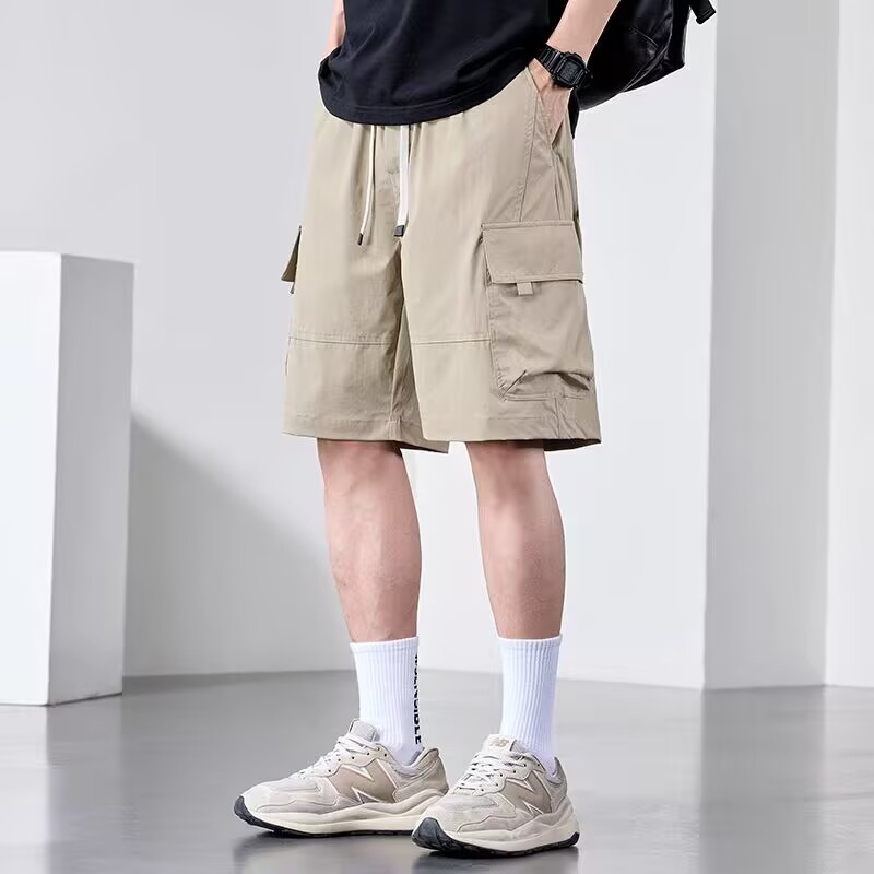 Camisas con menos ropa, pantalones casuales de seda de hielo ligeros, estilo fino de verano para hombres, monos estadounidenses transpirables, pantalones cortos sueltos de cinco puntos