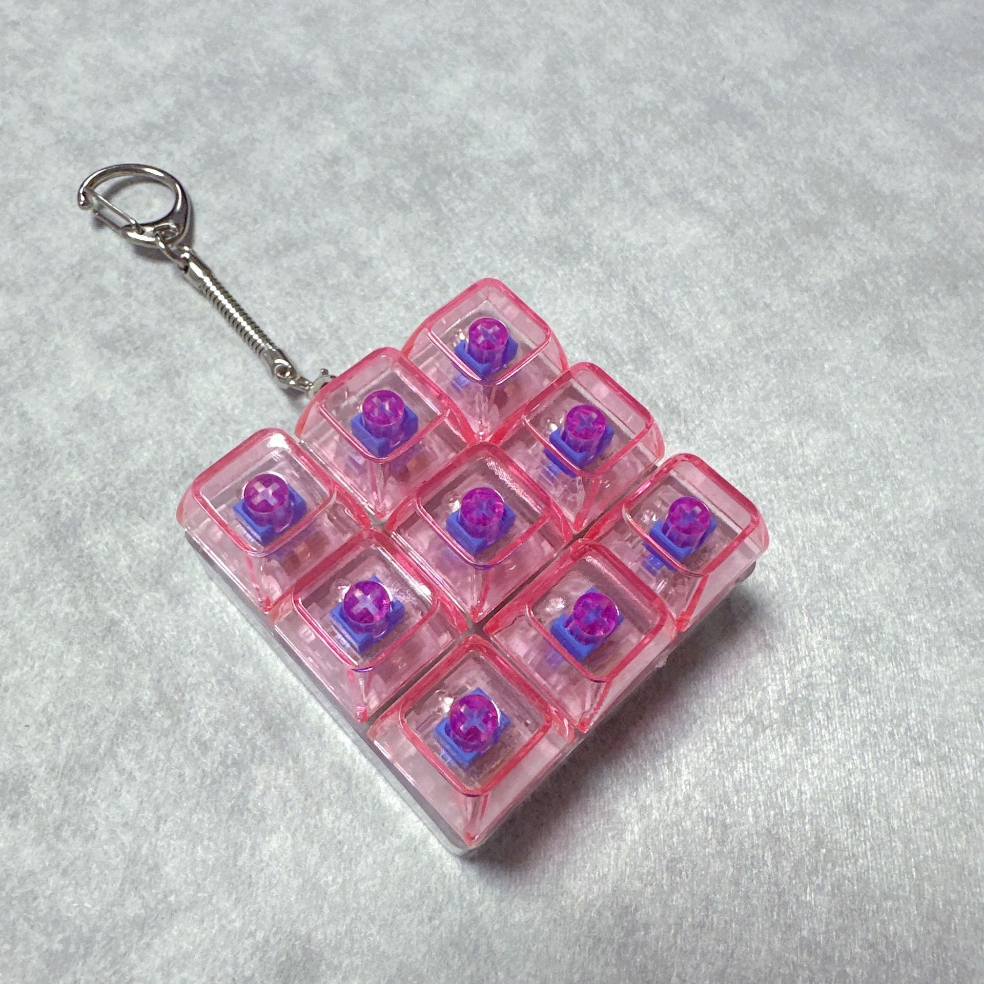 跨境9键PC全透明材质解压试轴器按压有声清脆带灯透明帽钥匙扣