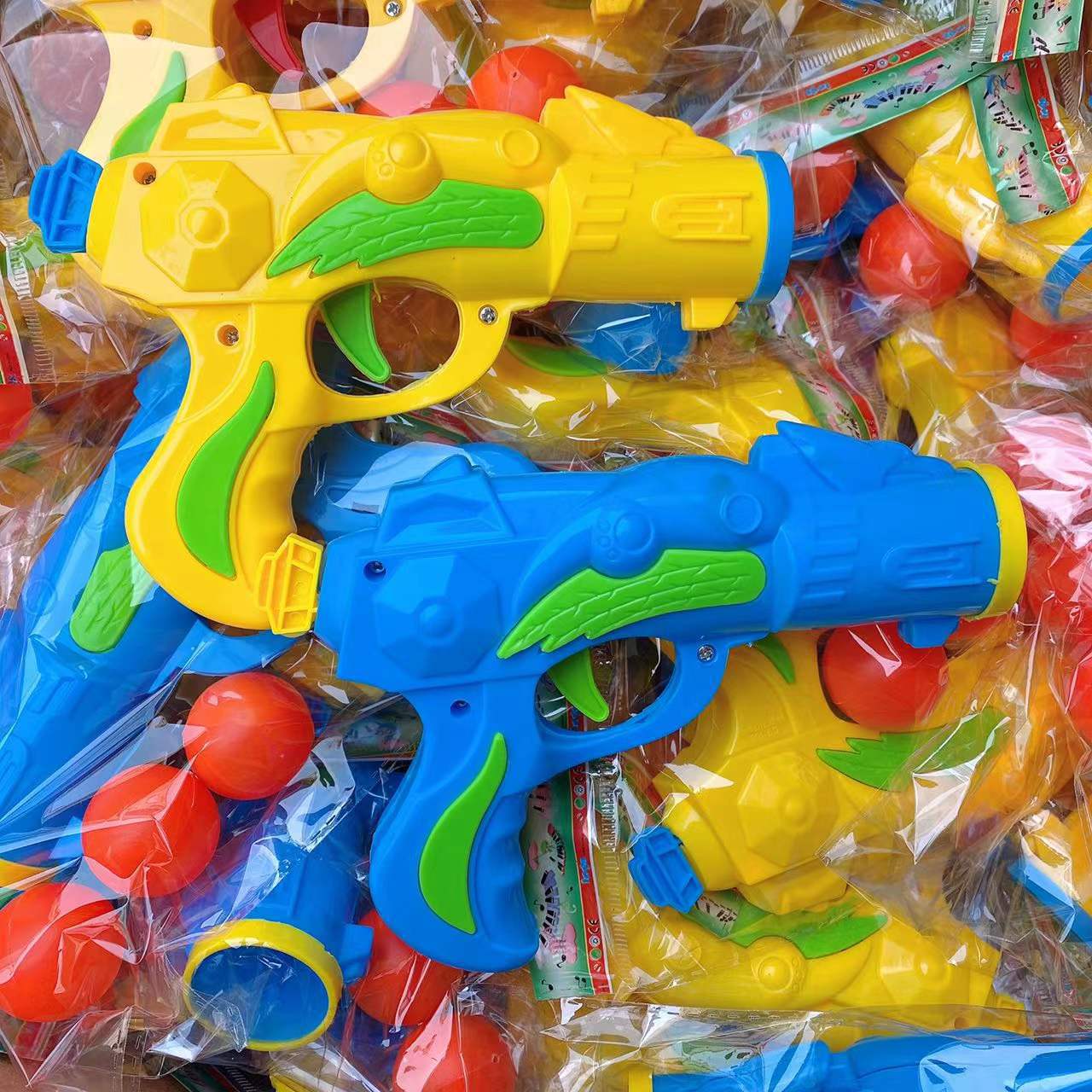 Juguetes para niños playa Tarjeta de succión juguete pistola juego casa juguete pintura juguetes 2 yuanes grandes almacenes al por mayor
