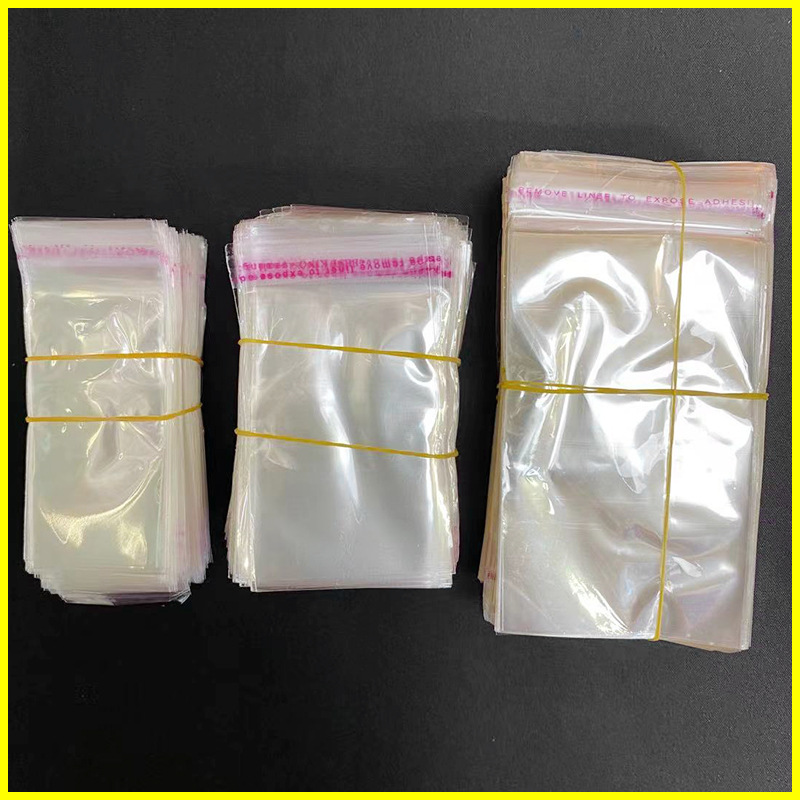 现货不干胶自粘袋OPP袋自封袋透明塑料服装小饰品卡头百货包装袋
