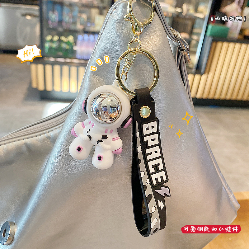 Dibujos animados cosmonauta astronauta astronauta muñeca llavero accesorios de automóvil creativos lindo bolso de pareja colgante regalo
