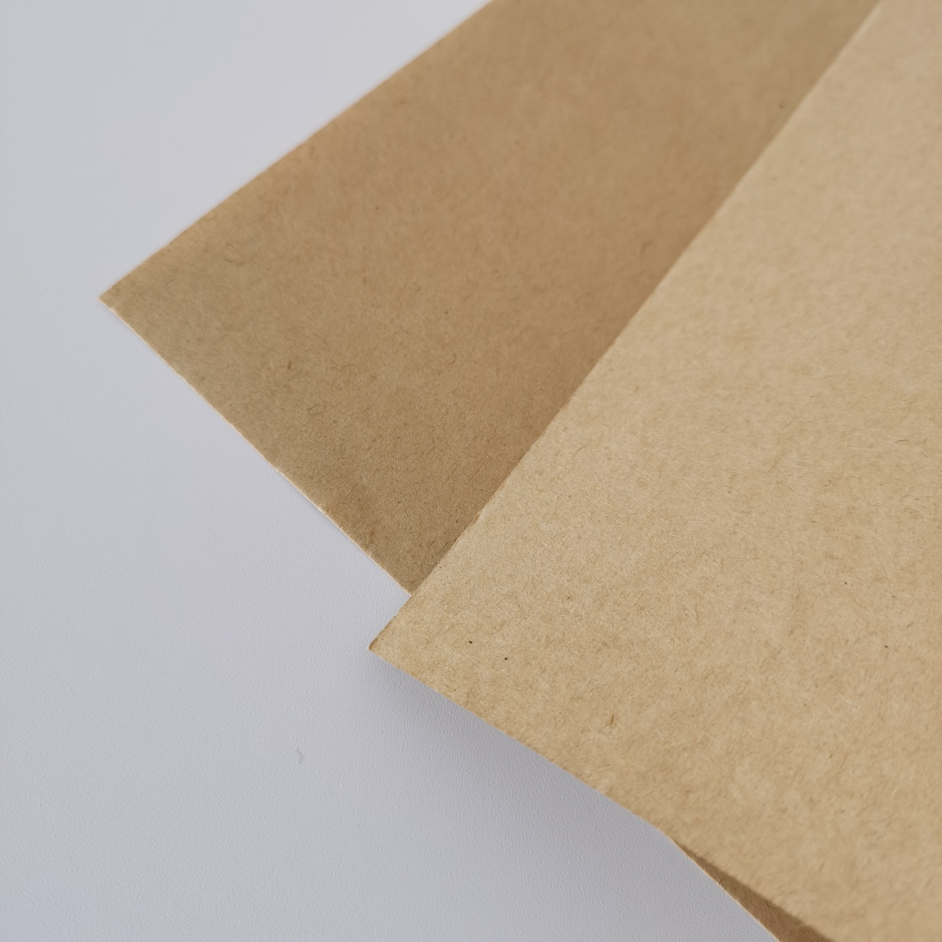 厂家供应50g防油纸包装牛皮纸 黄色双面光打包纸防潮牛皮纸汉堡纸