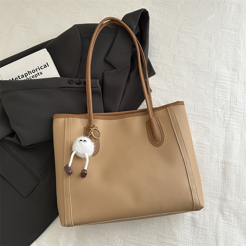 Bolsa axillar de gran capacidad para mujeres 2024 nueva moda otoño invierno sensación de bolso de hombro para estudiantes casuales bolso de clase