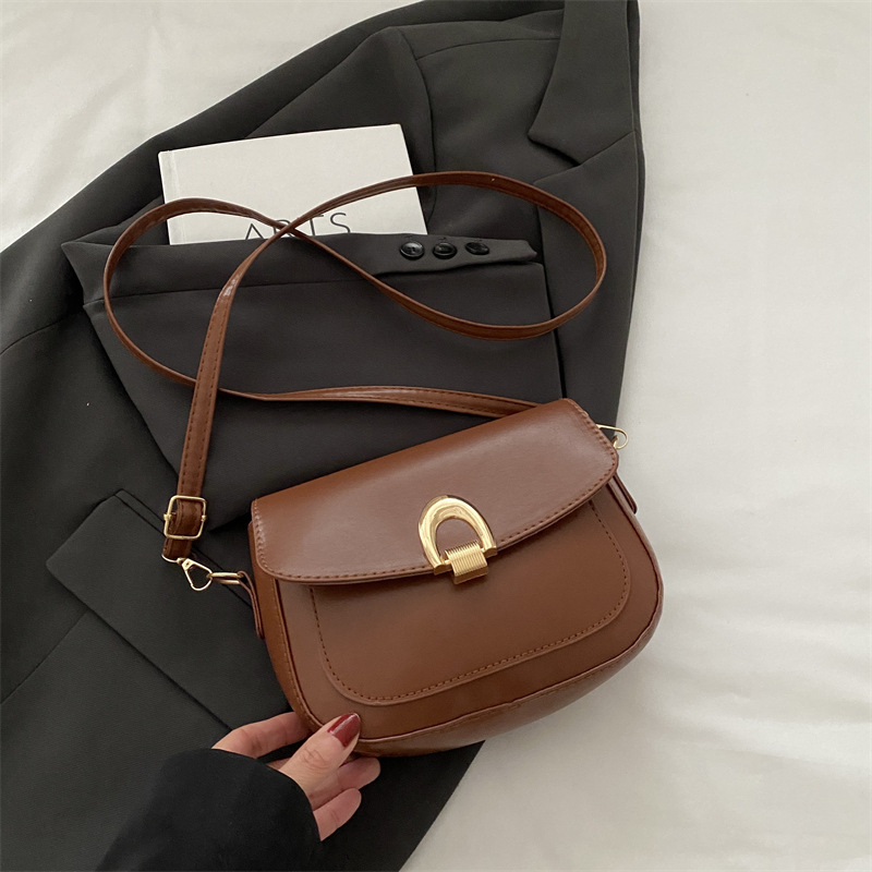 A principios de la primavera de 2025, bolsos de silla de moda casuales coreanos, bolsos de mujer de alta calidad.