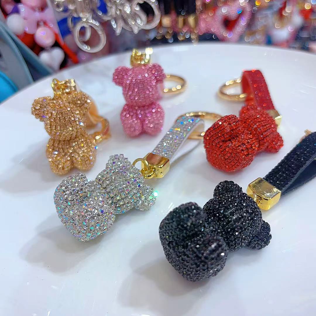 Venta directa de fábrica de lujo completo diamante muñeca llavero pajarita cabeza grande oso completo diamante bolsa colgante coche llavero