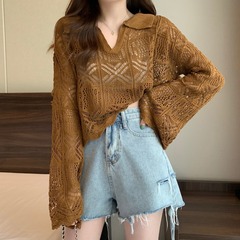 透かし彫りのデザイン感の早春のブラウスの長袖のニットの女性の新型の甘くて辛いラッパの袖のギャルの上着