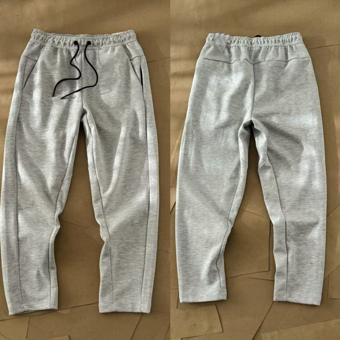 Nuevo hombre deportivo ocio al aire libre versátil punto suelto pantalones largos de piernas largas pantalones 211
