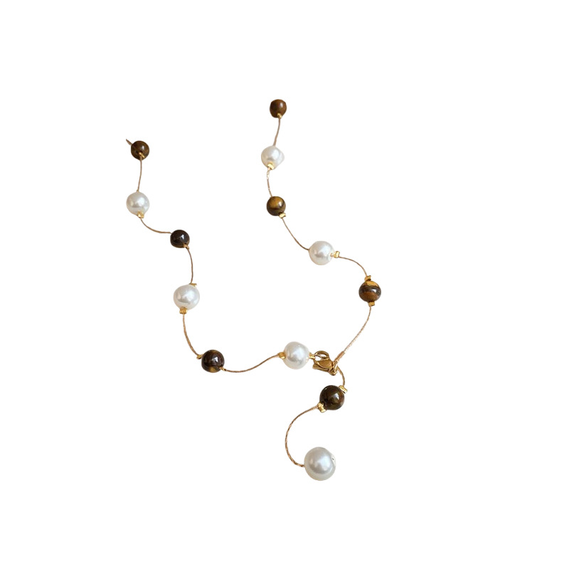 Collar de perlas de piedra de ojo de tigre artificial transfronterizo otoño e invierno cadena de suéter de todo fósforo de nicho accesorios de joyería de moda de alta gama