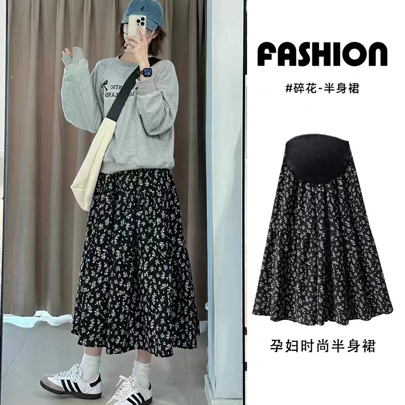 High-waisted floral midi skirt for pregnant women, suitable for spring and autumn, versatile A-line design with a flowing silhouette High-waisted floral midi skirt for pregnant women, suitable for spring and autumn, versatile A-line design with a flowing silhouette