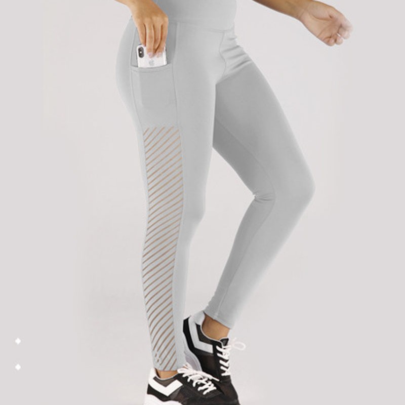 Nueva fábrica directa transfronteriza caliente yoga pantalones cadera levantamiento cintura apretado deportes pantalones costura malla bolsillo polainas
