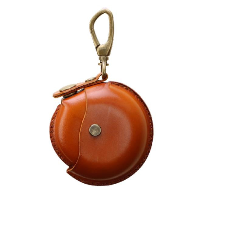 クリエイティブな一層牛革製ハンドメイド小銭入れ、イヤホンケーブル収納バッグ、丸型バッグ、ペンダント、小物入れ、レトロ収納バッグ