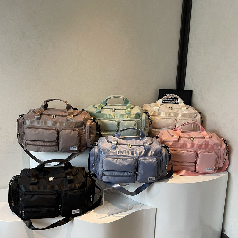 2025 nueva moda bolsa deportiva de fitness seca y húmeda separación bolsa de natación para hombres bolsa de viaje de hombro portátil de tela Oxford para mujeres