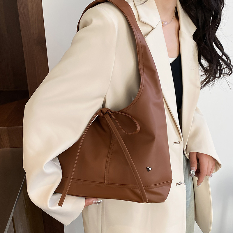 2025 nicho coreano bolso de mujer de viaje bolso casual universal arco de gran capacidad bolso de hombro único brazo