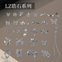 新しいLZ蝶ジルコンのネイルアクセサリーが爆発して豪華で、リボン付きのフランスチェーンが甲のアクセサリーを着ている