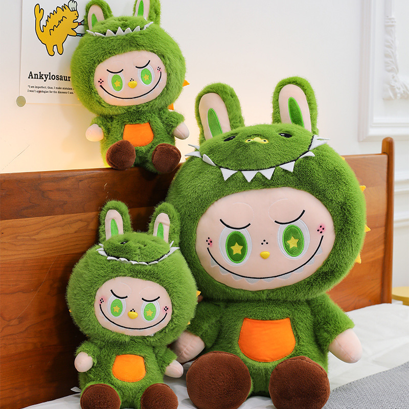 新しいミンクのぬいぐるみぬいぐるみ人形が恐竜の誕生日プレゼントに変身しました。|undefined