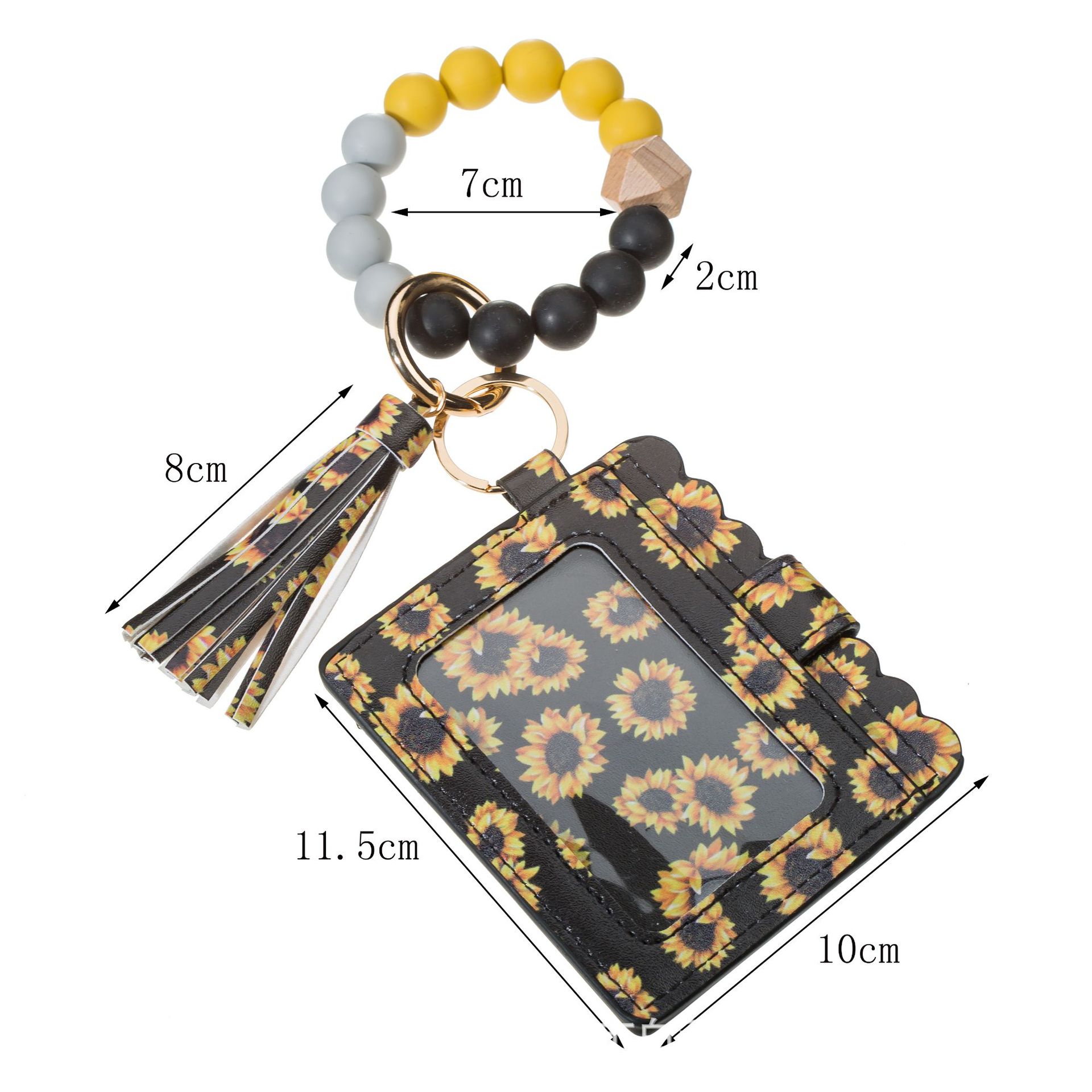 Simple Style Heart Shape Flower Butterfly Silica Gel Beaded Unisex Bag Pendant Keychain display picture 1