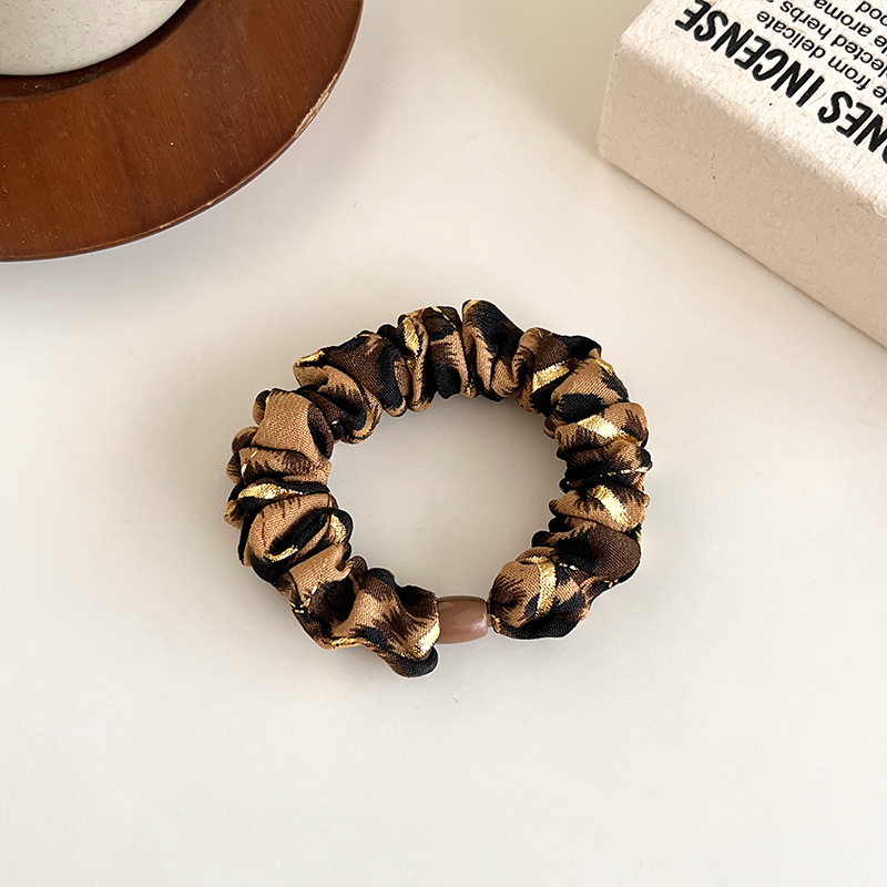 Temperamento europeo y americano estampado leopardo anillo de cabello simple de alta elástica cuerda de cabello gruesa cuerda de cabello de bolas duradera correa