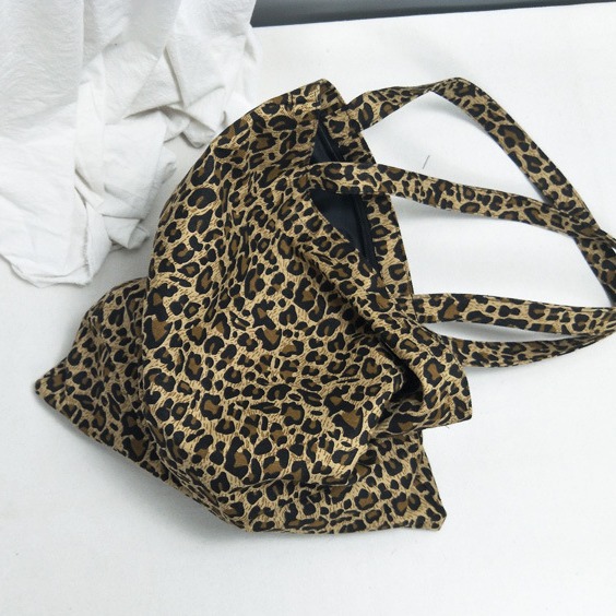Bolso de lona con estampado de leopardo nuevo todo fósforo Corea del Sur elegante bolso de hombro retro para mujer bolsa de compras de una sola pieza de entrega