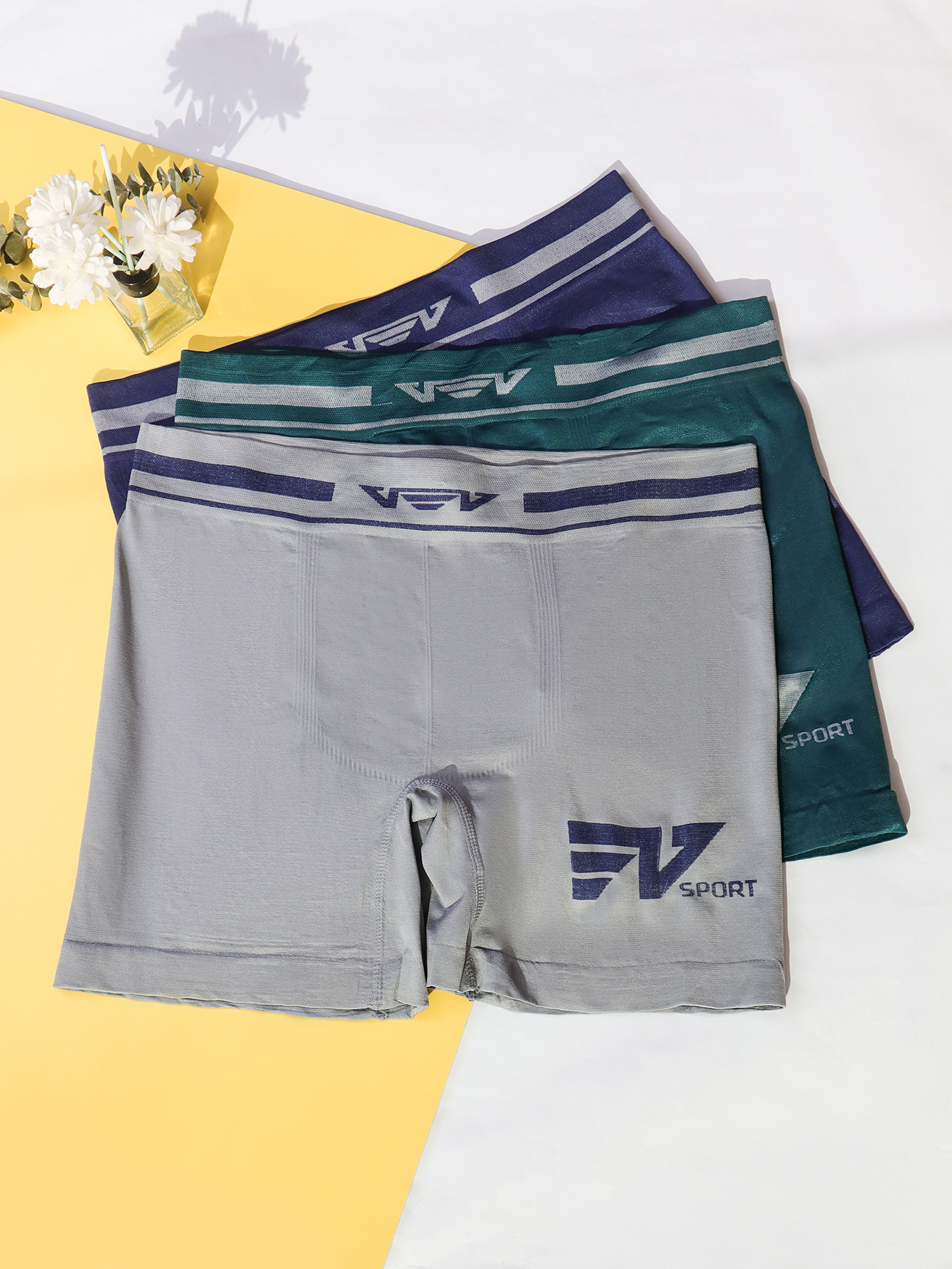 Calzoncillos bóxer deportivos para hombre, de cintura media, sin costuras, de poliéster elástico, transpirable, con sensación de desnudez, de color sólido, de pierna larga.