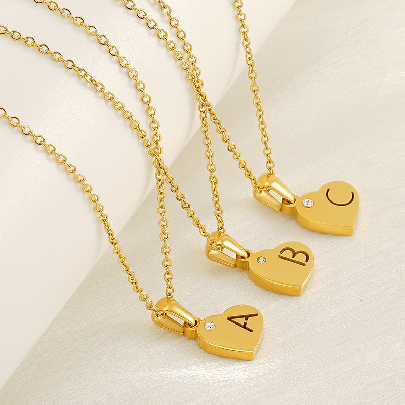 Europa y los Estados Unidos viento acero titanio amor colgante de diamantes 18K letras inglesas hueco collar de clavícula de acero inoxidable mujer