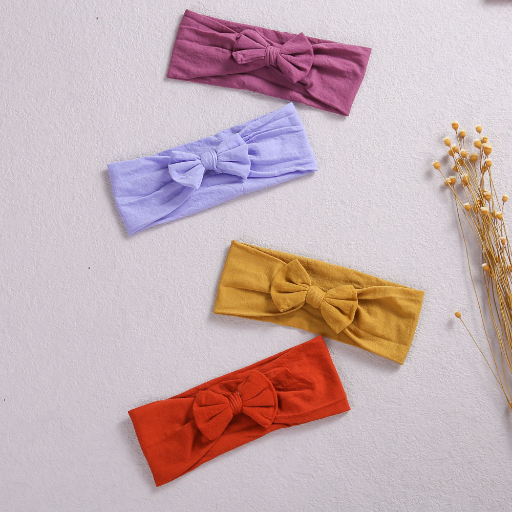 European and American cross-border new children's hair accessories baby bow headband baby care door nylon hair band wholesale_voghion.com