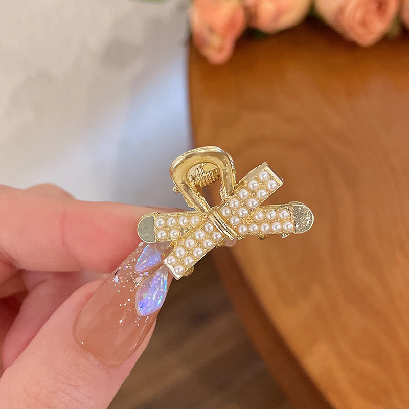 6058 Perla de lazo cruzado