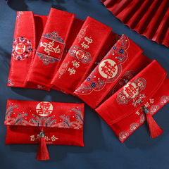 Elegant high-end red envelopes in Chinese style: luxurious brocade, traditional Chinese fabric designs, perfect for weddings, gift-giving, or as a thoughtful gesture to mark a change in family status—ideal for gifting up to 10,000 yuan.