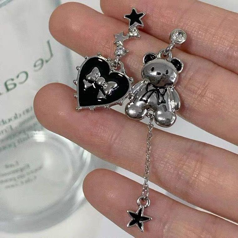 Diseño de nicho de alta gama borla larga sin orejas clip de oreja elegante estilo occidental de las mujeres cara-mirando pequeños nuevos pendientes de moda