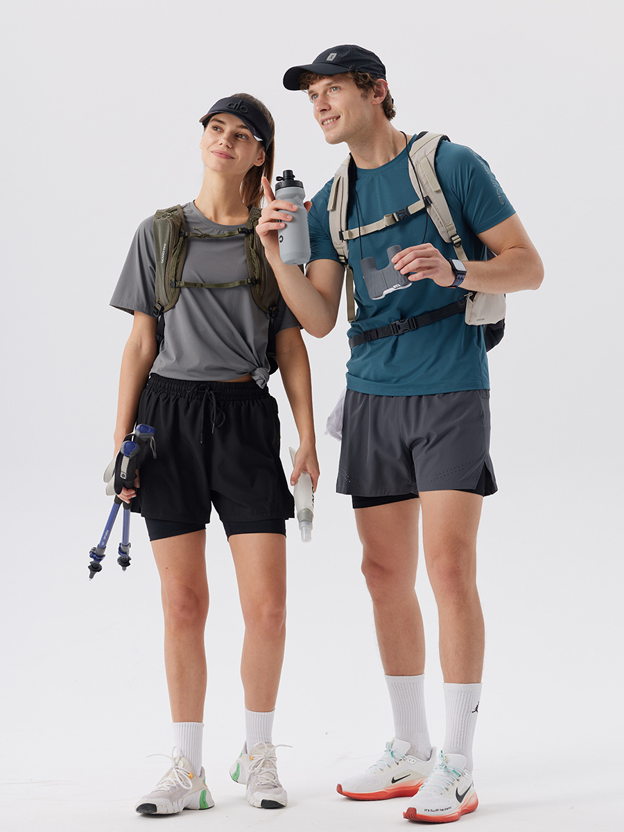 Pantalones cortos de secado rápido para hombres pantalones de maratón sueltos transpirables para revestimiento de pantalones de entrenamiento de fitness pantalones de tenis