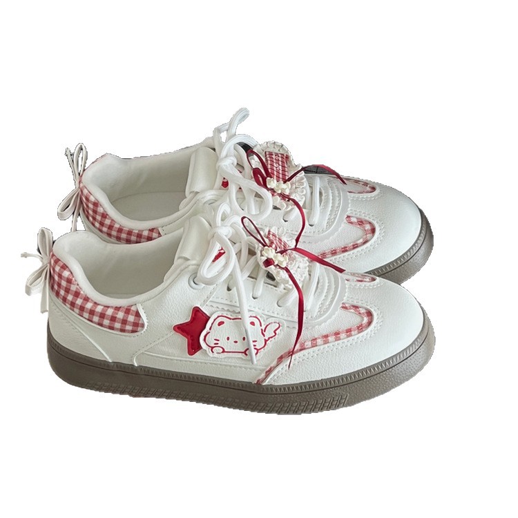 2026 primavera y otoño nuevo nicho sensación de diseño zapatos blancos de mujer lindos encaje versátiles zapatos de skate casuales de moda
