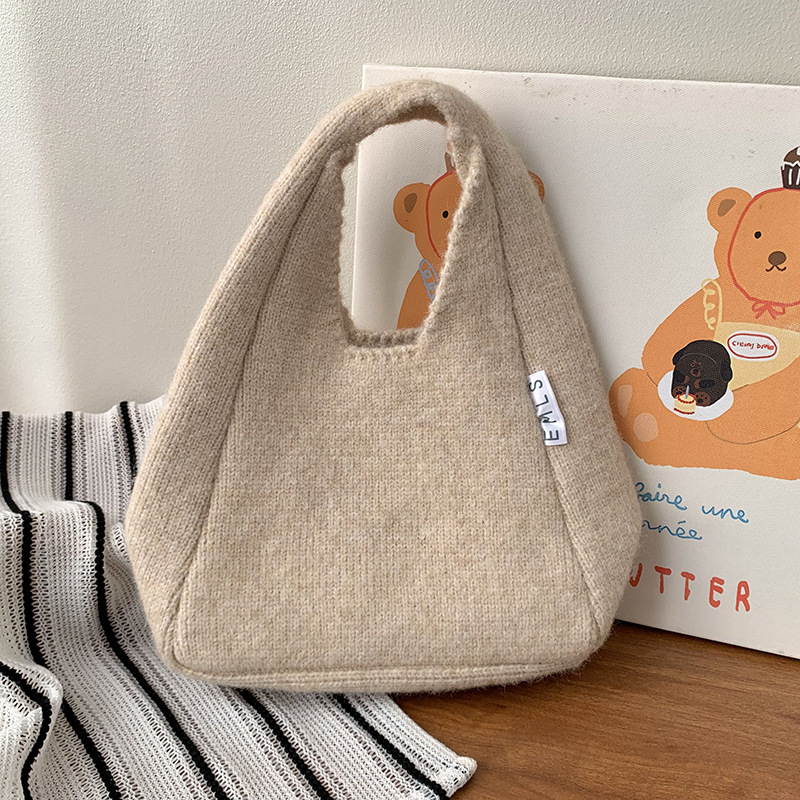 Nuevo otoño y invierno con bolso de lana, bolso de lana de mujer, estilo coreano de alta calidad, simple y versátil bolso de viaje de color sólido.