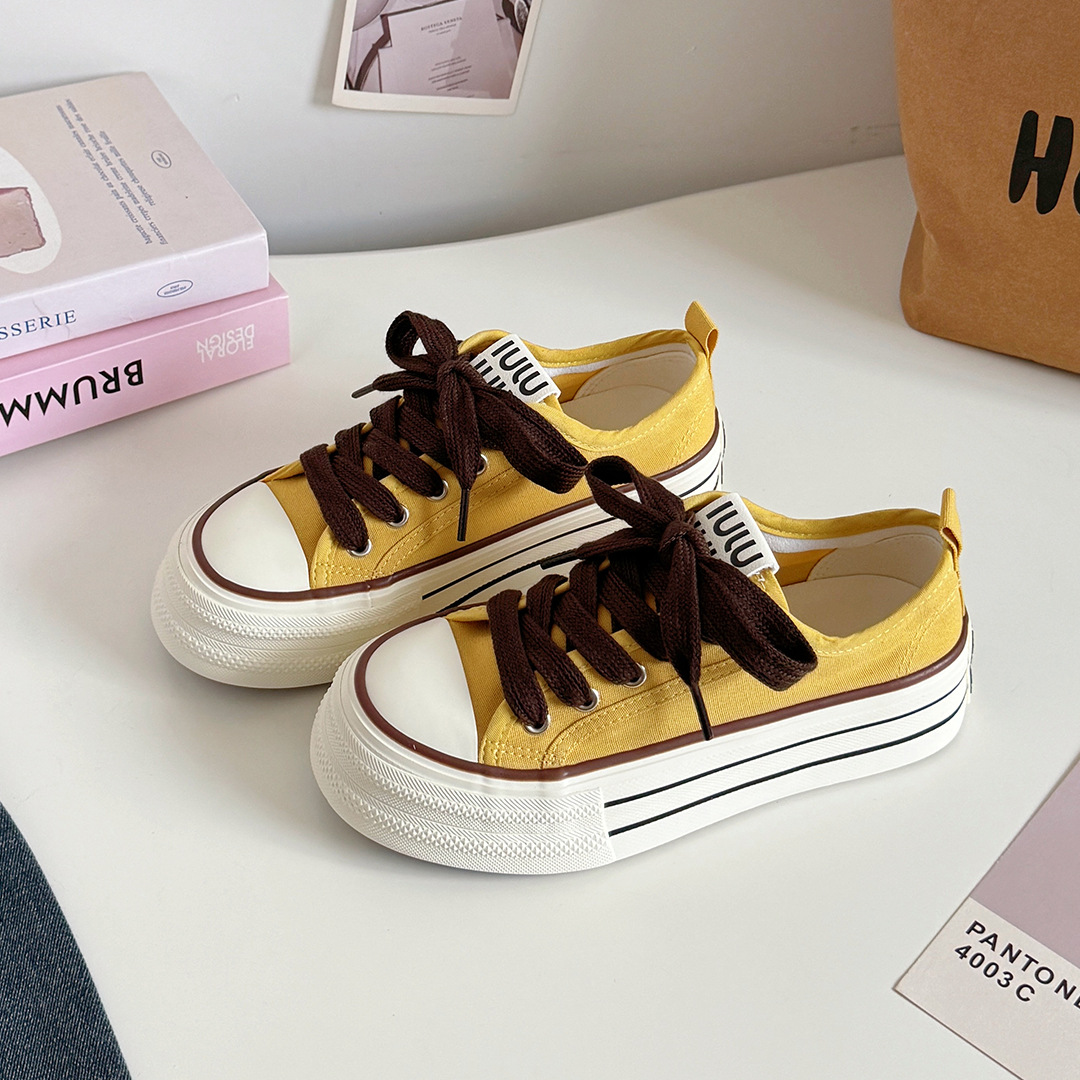 Estilo de Hong Kong nicho zapatos de lona de suela negra y gruesa mujer 2025 nuevos zapatos deportivos de tablero estudiantil h1323 a principios de otoño