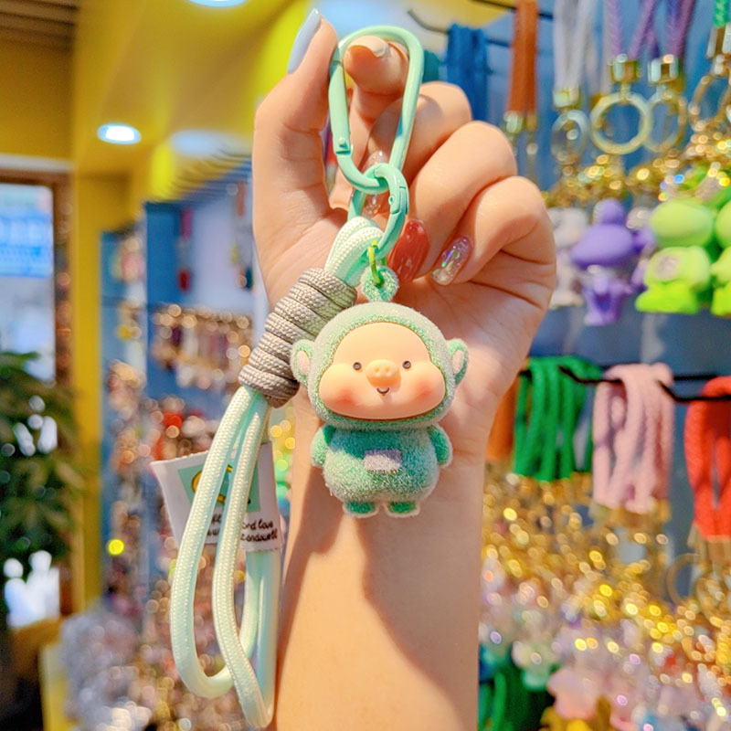 Antena de flojo de dibujos animados pareja llavero de coche creativo colgante de llave de bolsos de mujer colgante colgante al por mayor