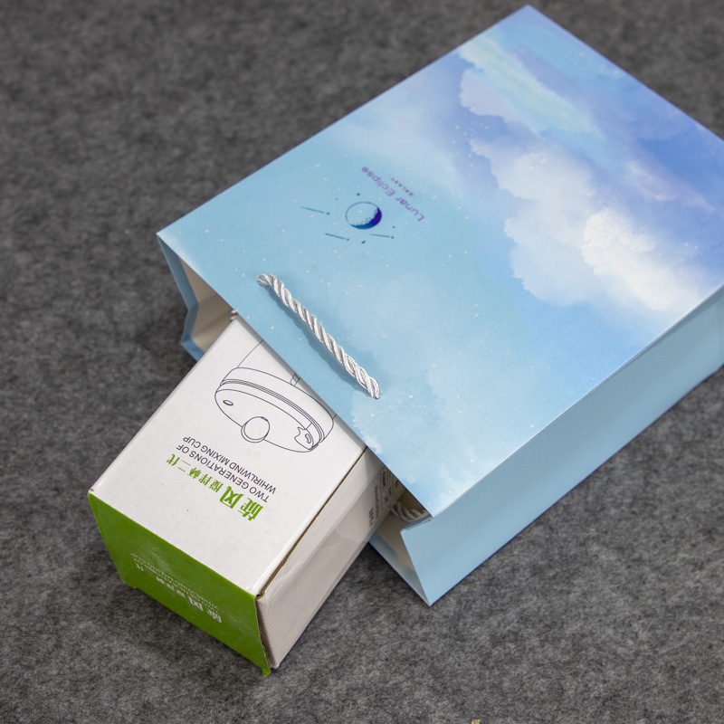 Creativo simple regalo de la mano bolsa de regalo de boda ins estilo cielo estrellado caja de regalo bolsa de papel portátil de protección del medio ambiente