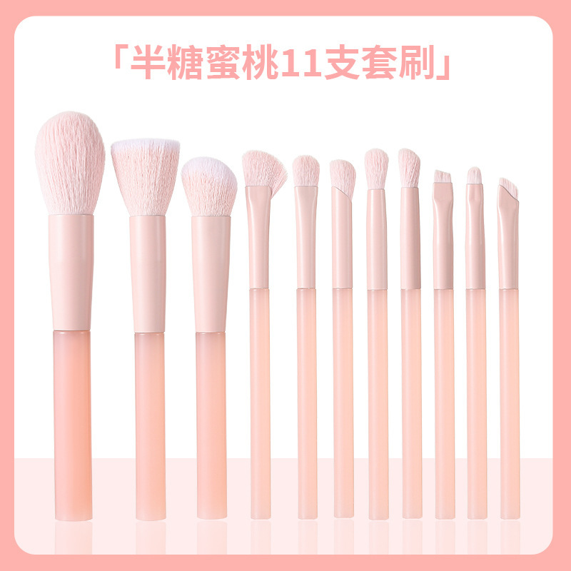 新しい11本の長い柄の蜜桃の粉の頬紅は顔の化粧の道具のアイシャドーのブラシを塗って傷のファンデーションの化粧のブラシのセットを覆います。|undefined