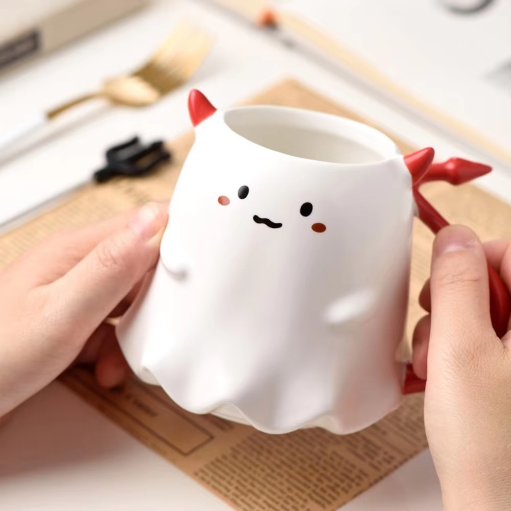 Bonita taza de cerámica con forma de diablo con horquilla de dibujos animados creativos Qin Sheng taza de cerámica marca de taza de cubiertos diarios taza de agua