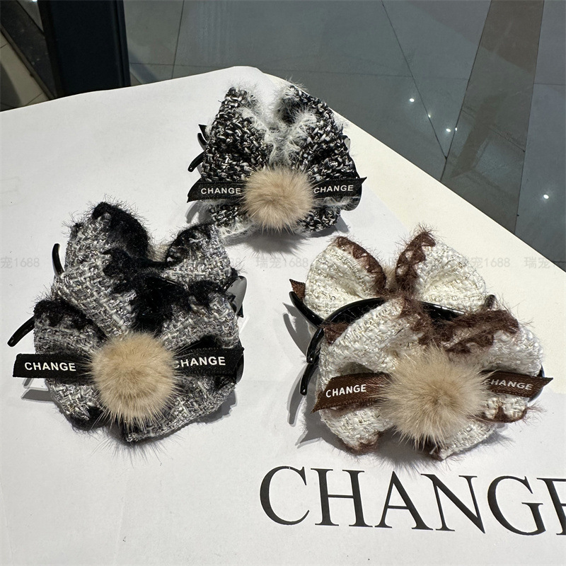 髮夾女後腦勺韓國設計感2023新款小香風蝴蝶結毛球抓夾高馬尾夾子