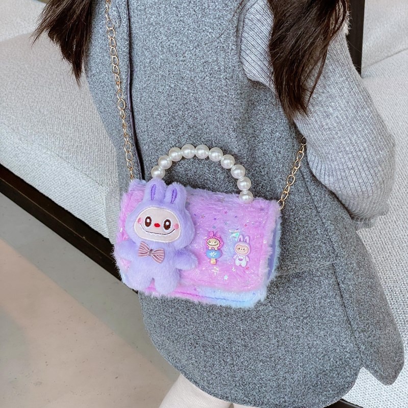 Nuevos bolsos infantiles otoño / invierno coreano niñas lindos bolsos de mochila de moda niñas bolsos de peluche bolsos de perlas