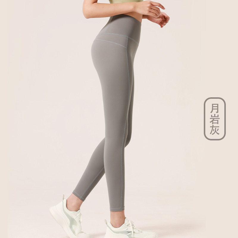Juyitang europeo y americano desnudo melocotón verano fitness Pantalones mujer apretado cintura alta cadera elevación estiramiento correr deportes yoga Pantalones