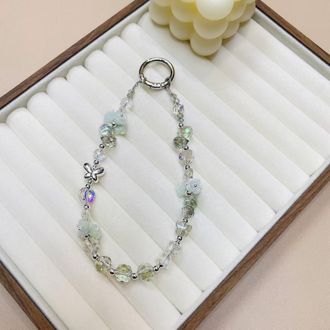 Ins Advanced Gel suave Luminous Rose Flower Funda para teléfono móvil Cadena colgante Aleación Mariposa Cordón portátil Lujo ligero Original