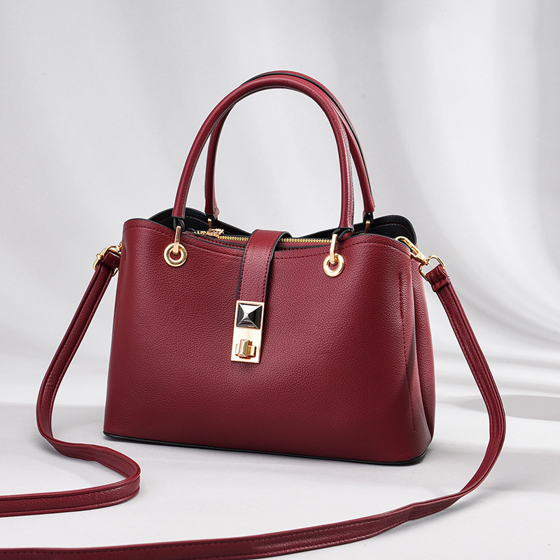 Bolso de mano moderno y elegante para mujeres de mediana edad, 2025, bolso tote simple de gran capacidad para el hombro y bandolera.