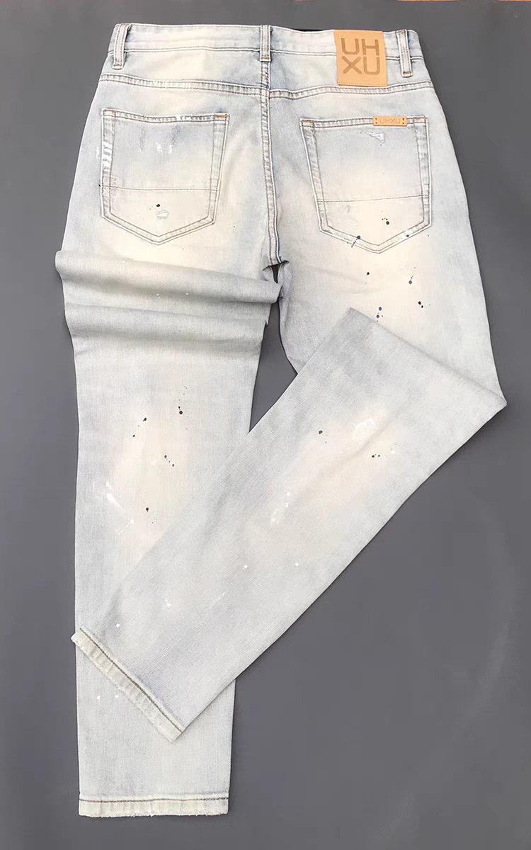 Jeans uomo slim fit elasticizzati con strappi e patch casual_voghion.com